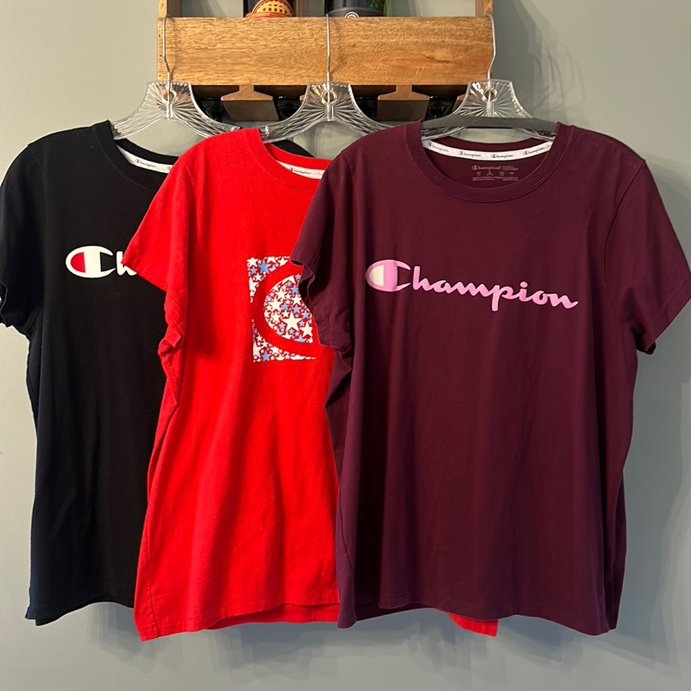 Woman’s lot of 3, 1X champion T-shirts with graphics, black, red, purple